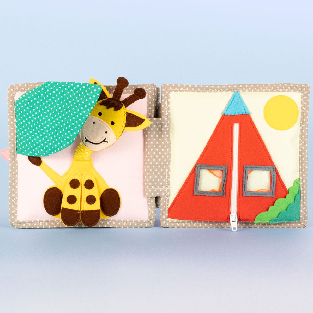 Mini Quiet Book Schillernder Papagei (ab 6 Monate)- Jolly Designs