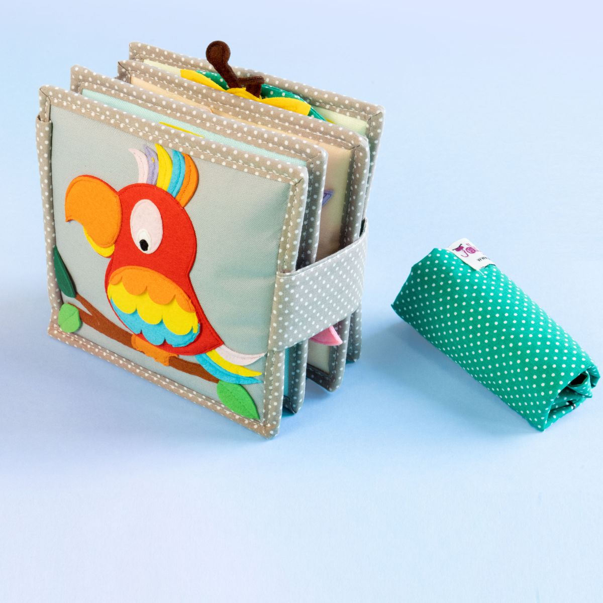 Mini Quiet Book Schillernder Papagei (ab 6 Monate)- Jolly Designs