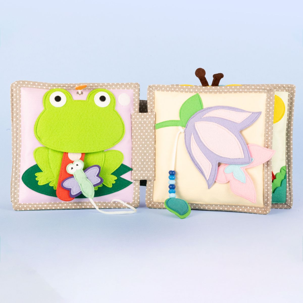 Mini Quiet Book Schillernder Papagei (ab 6 Monate)- Jolly Designs